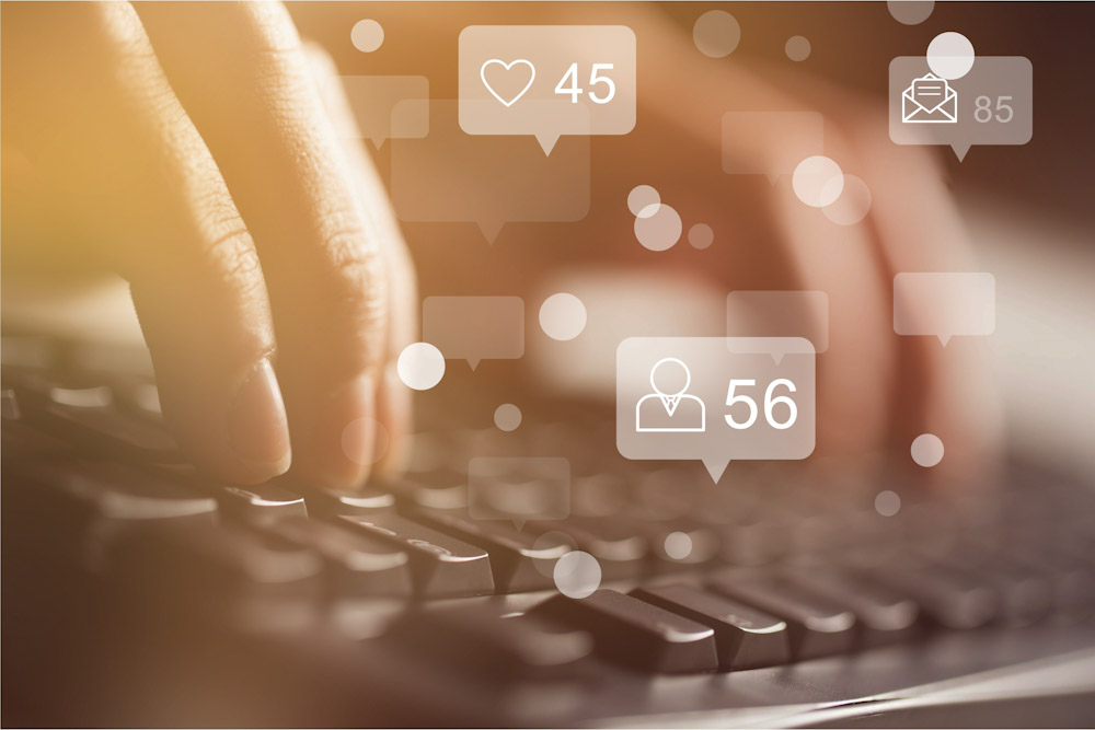 Digital marketing asset showing keyboard typing and engagement icons